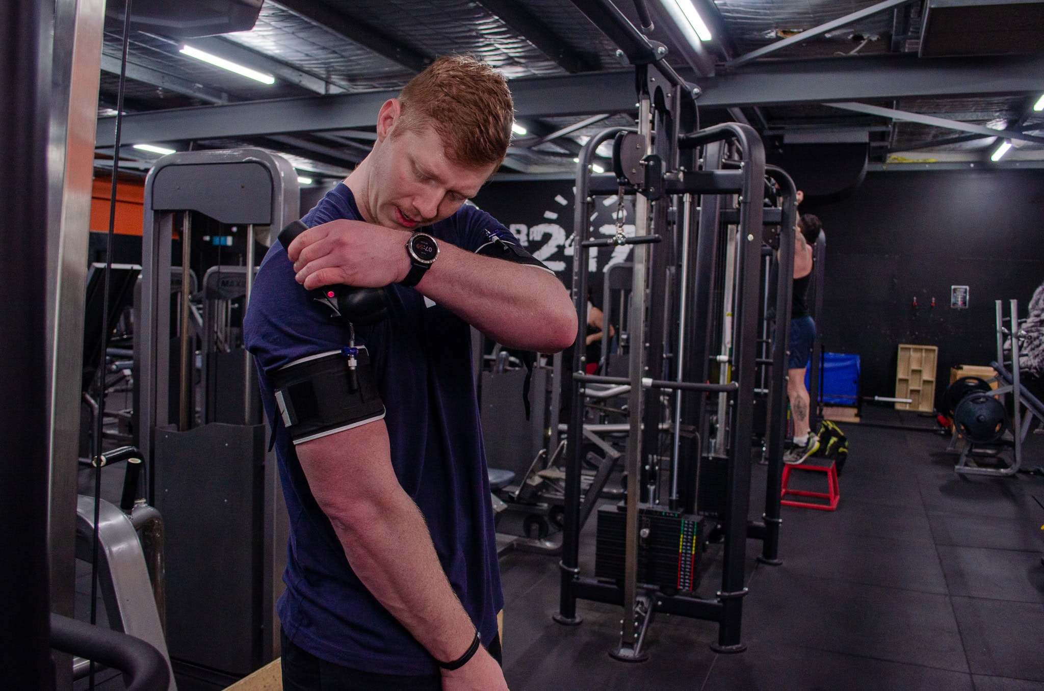 Athlete doing blood flow restriction training in the gym